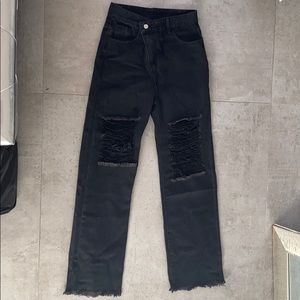 black ripped loose jeans